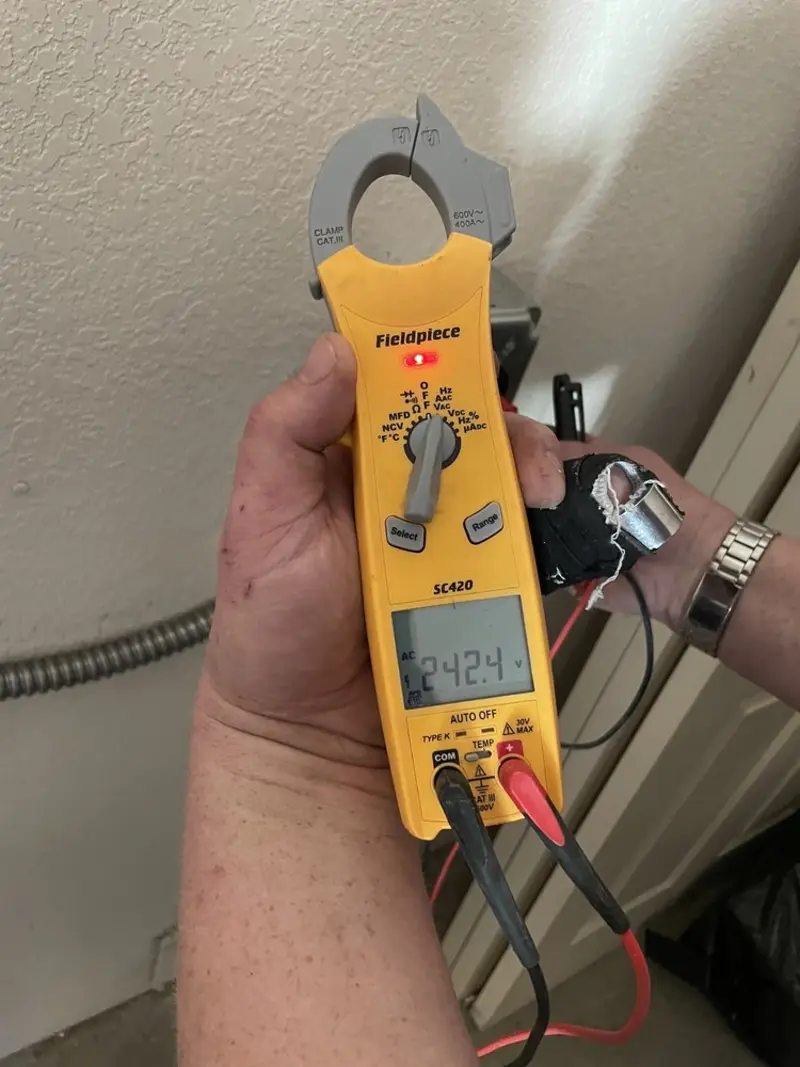 Voltage testing with clamp meter during Electrical Installation Services in Archdale